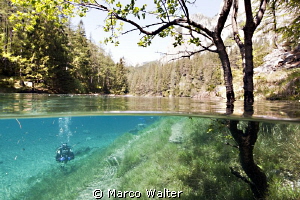 Another half & half shot from the 'green lake' in Austria by Marco Walter 